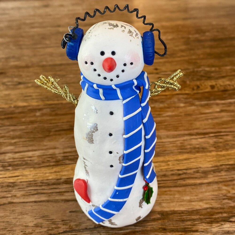 Happy Snowman w/Blue & White Shawl & Blue Ear Muffins